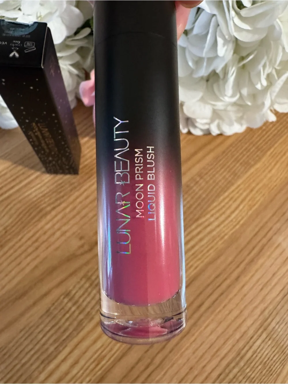 Lunar Beauty Moon prism liquid blush in fuego fuchsia